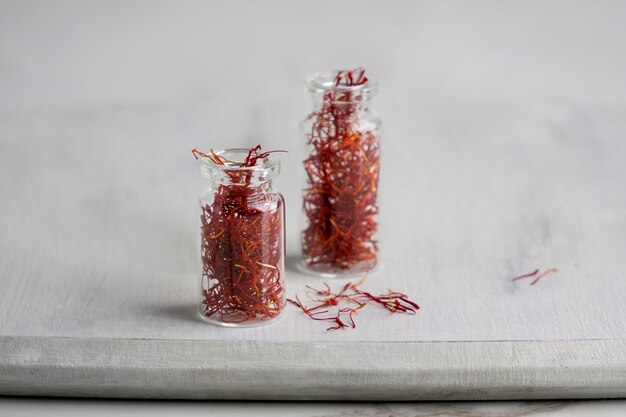 Close up on saffron in small bottles