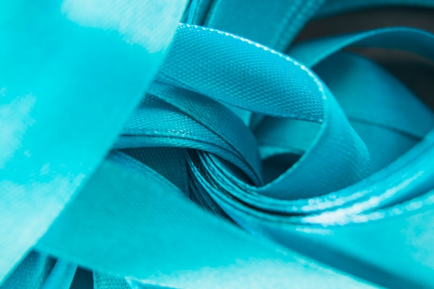 Free Photo close-up of satin blue curled ribbon