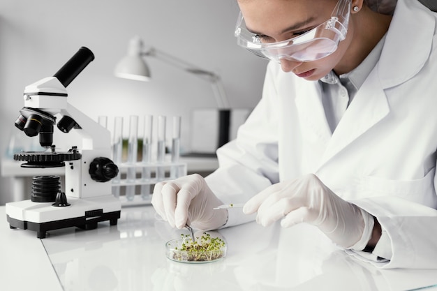 Close up scientist wearing goggles