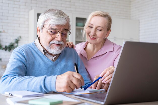 Close up on senior couple while learning