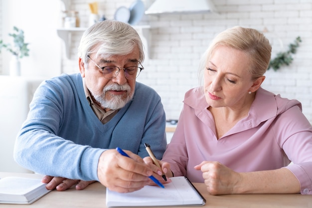 Close up on senior couple while learning