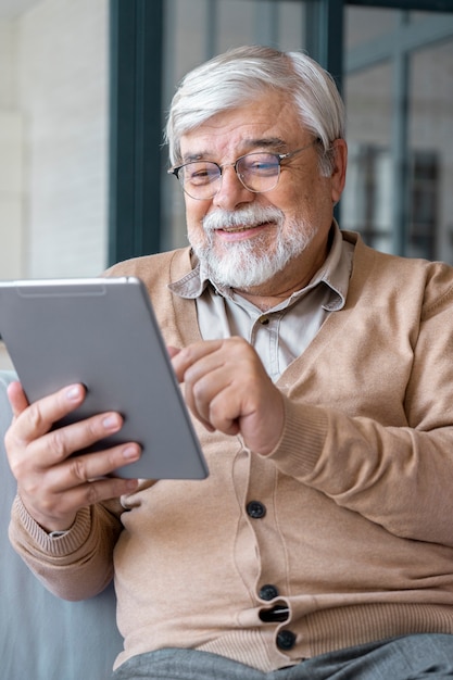 Close up on senior person while learning