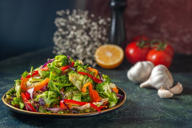 Close up shot of delicious vegan salad with fresh ingredients in a plate