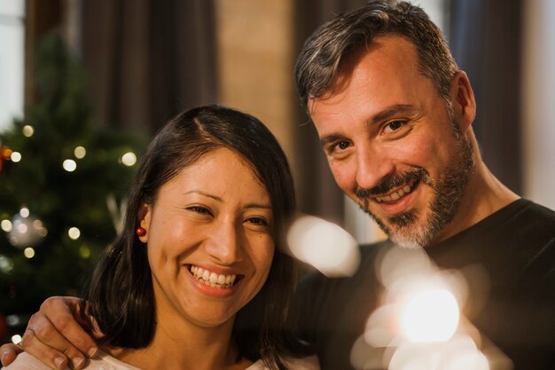 Close-up shot smiling senior couple with light