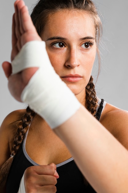 Free Photo close-up shot of woman wearing fitness clothes