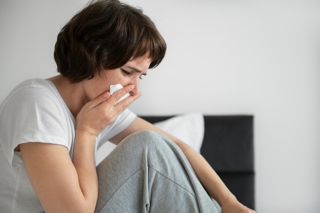 Free Photo close up sick woman at home