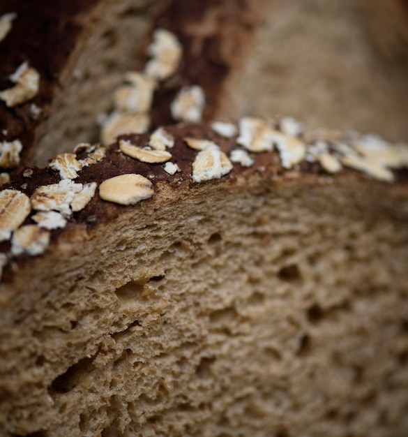 Free photo close up of a slice of brown bread