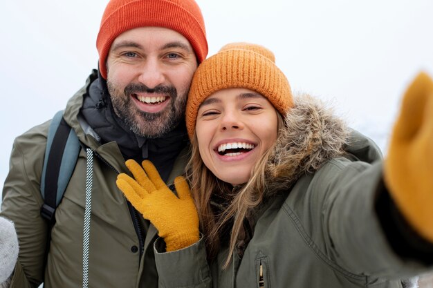 Close up smiley couple in nature