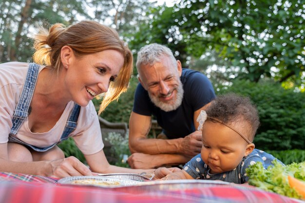 Close up smiley family with food