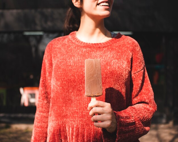 Close-up smiley girl with ice cream