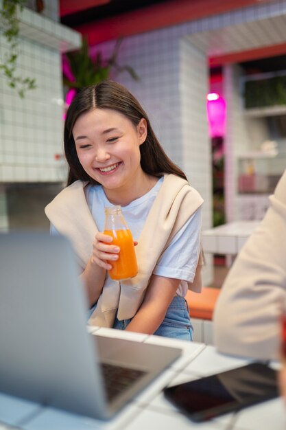 Close up smiley girl with juice