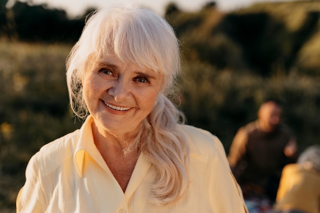 Close up smiley woman outdoors