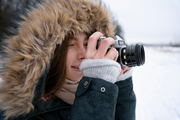 Free photo close up smiley woman taking photos