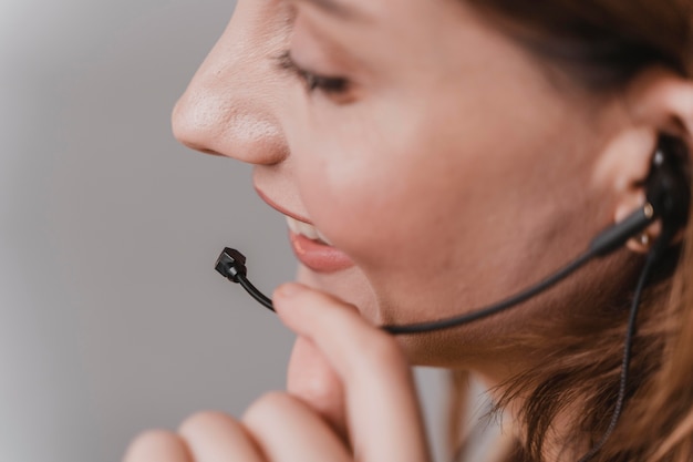 Close-up smiley woman with microphone