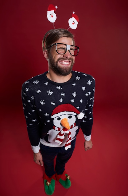 Close up of smiling man dressed in Christmas clothes