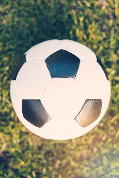 Free photo close-up soccer ball on grass