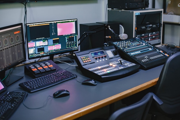 Close up of sound engineer studio with equipment