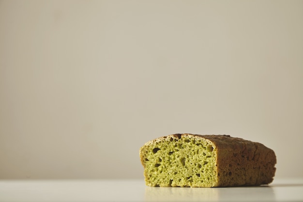 Close up spinach bread healthy made without sugar and salt isolated on white