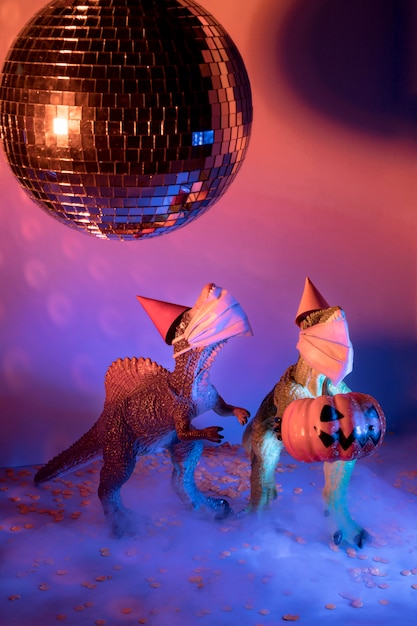 Free photo close-up spooky halloween toys and disco ball