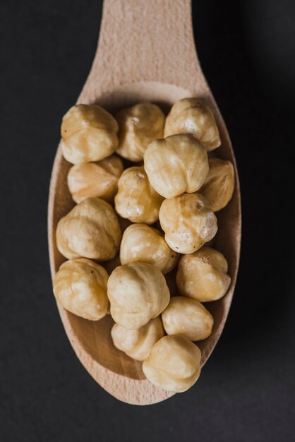 Close-up spoon with hazelnuts