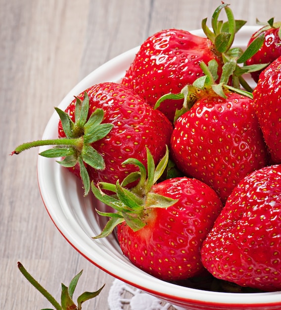 Close up of strawberry on wooden table