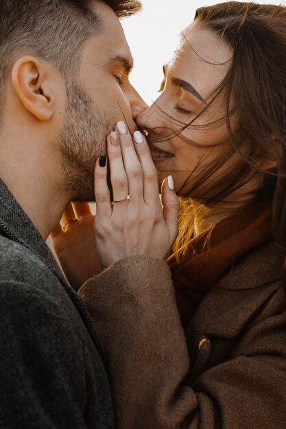 Close-up sweet couple kissing