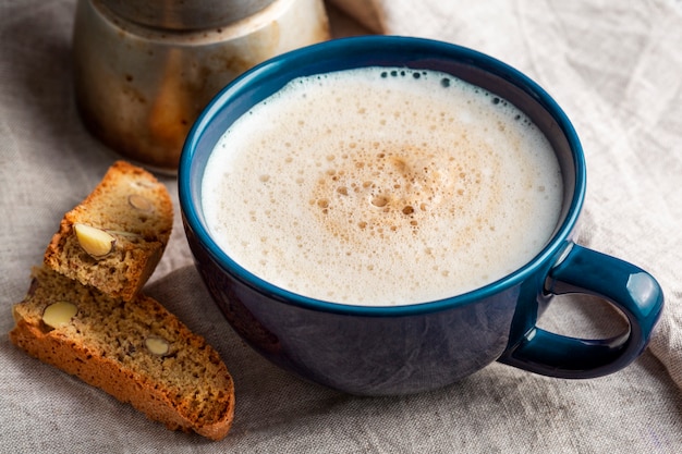 Free photo close-up tasty cup of coffee with milk