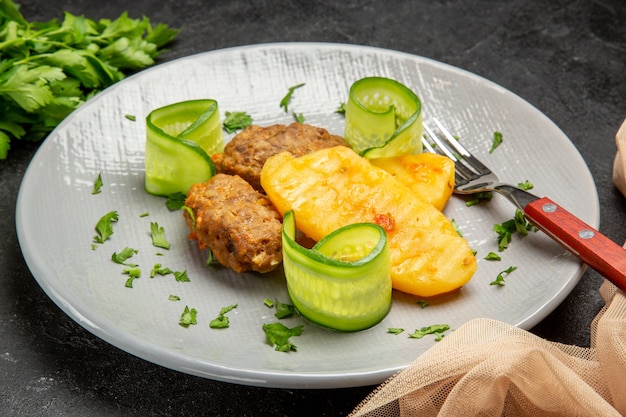 Close up on tasty cutlets chopped vegetables