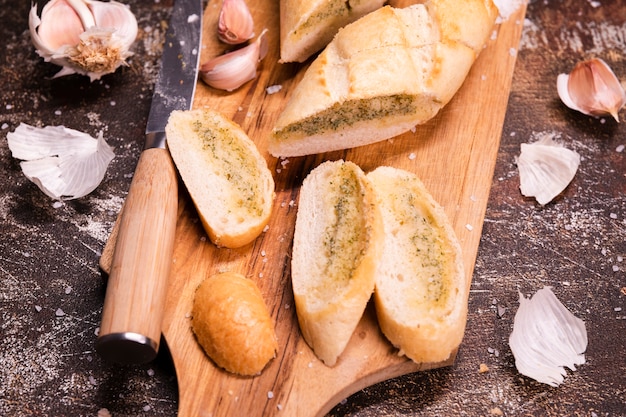 Close-up tasty garlic bread on the table