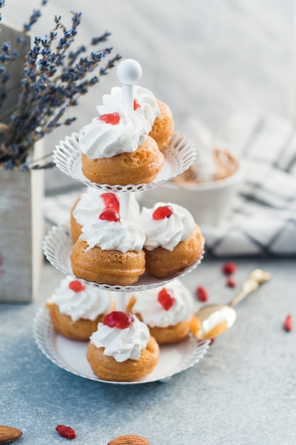 Free photo close-up of tasty muffins on concrete surface