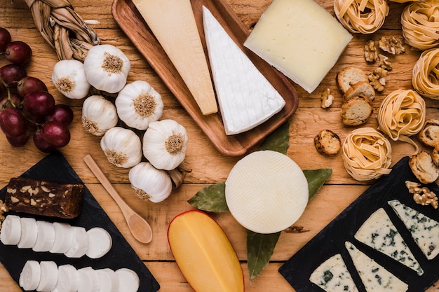 Free photo close-up of tasty raw food over wooden table