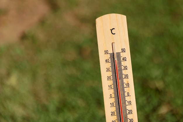 Free Photo close up on thermometer showing high temperature