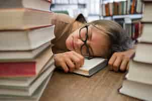 Free photo close-up tired woman at library