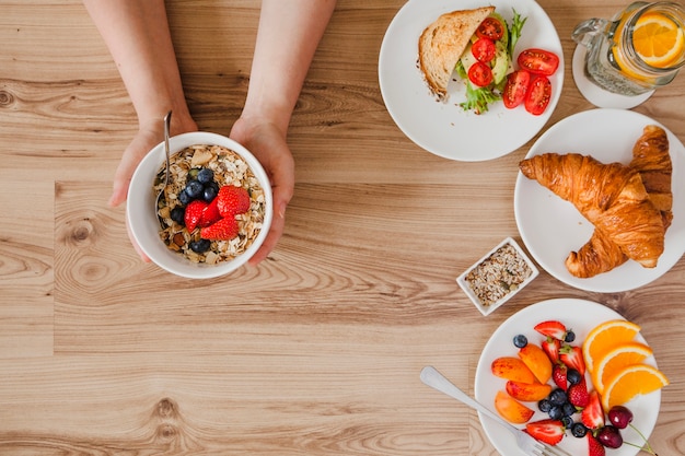 Free Photo close-up top view of person having breakfast