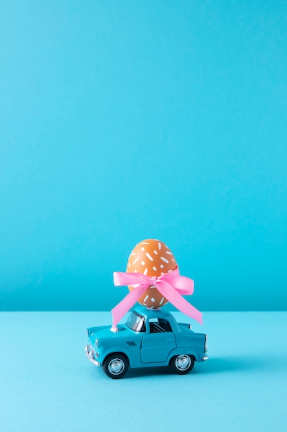 Free photo close up on toy car with easter eggs