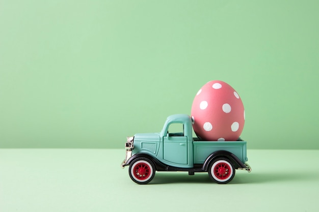 Free Photo close up on toy car with easter eggs