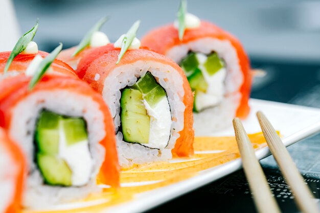 Close up of tuna sushi rolls with avocado