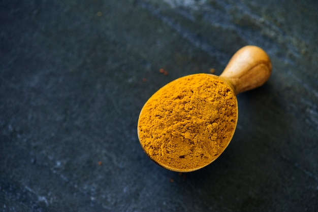 Free photo close up of turmeric powder