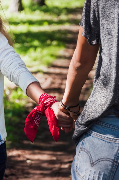 Free photo close-up of two sisters holding hands