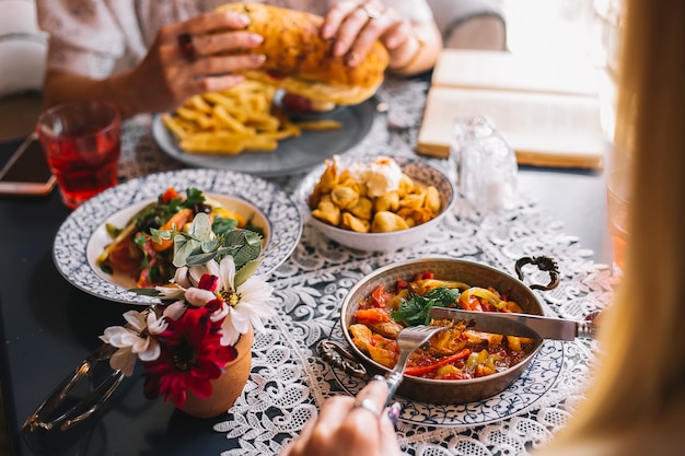 Close up of two women having lunch together at cafe