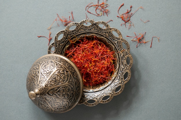 Close up on utensils full of saffron