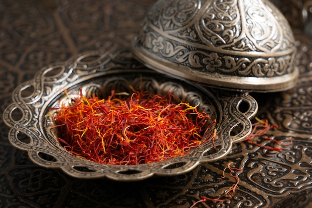 Close up on utensils full of saffron