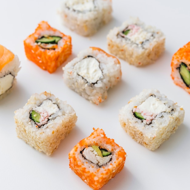 Free photo close up view of arranged assortments of sushi