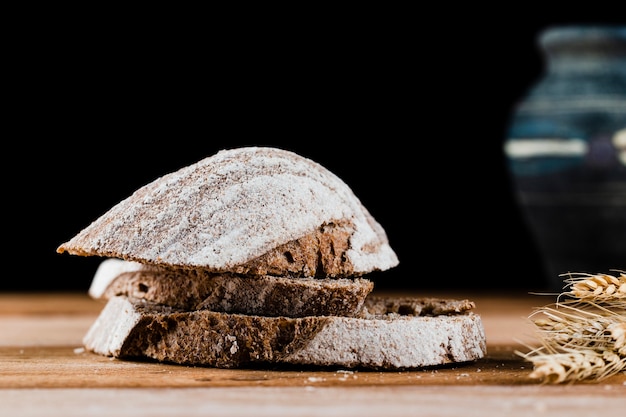 Close-up view of bread slices on wooden table