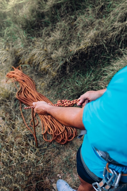 Close up view of climber holding rope