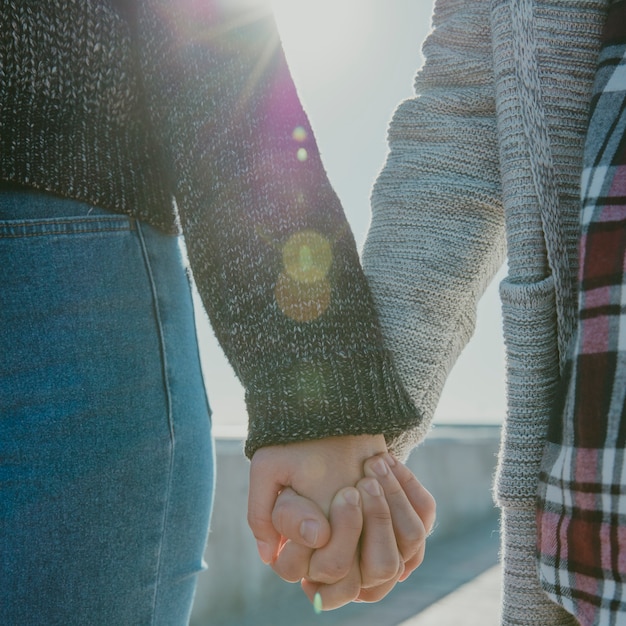 Free Photo close up view of couple holding hands