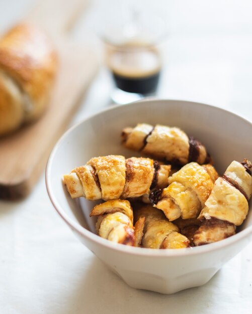 Close-up view of croissants  in a bowl