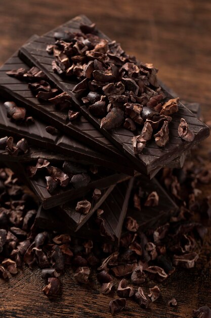 Free Photo close-up view of delicious chocolate on wooden table