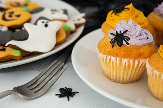 Free photo close-up view of delicious halloween cupcakes