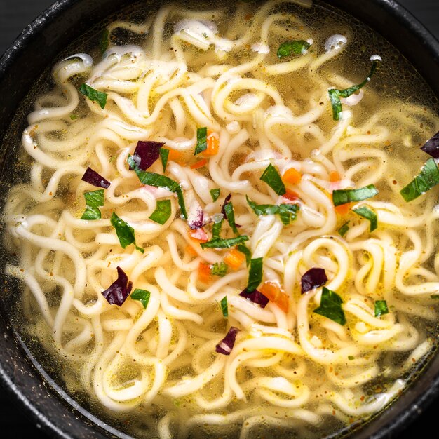 Close-up view of delicious noodles soup